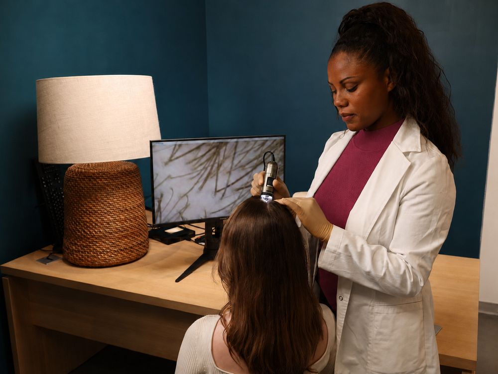 Scalp examined with a trichoscopy camera, the magnified image shown on the practice screen